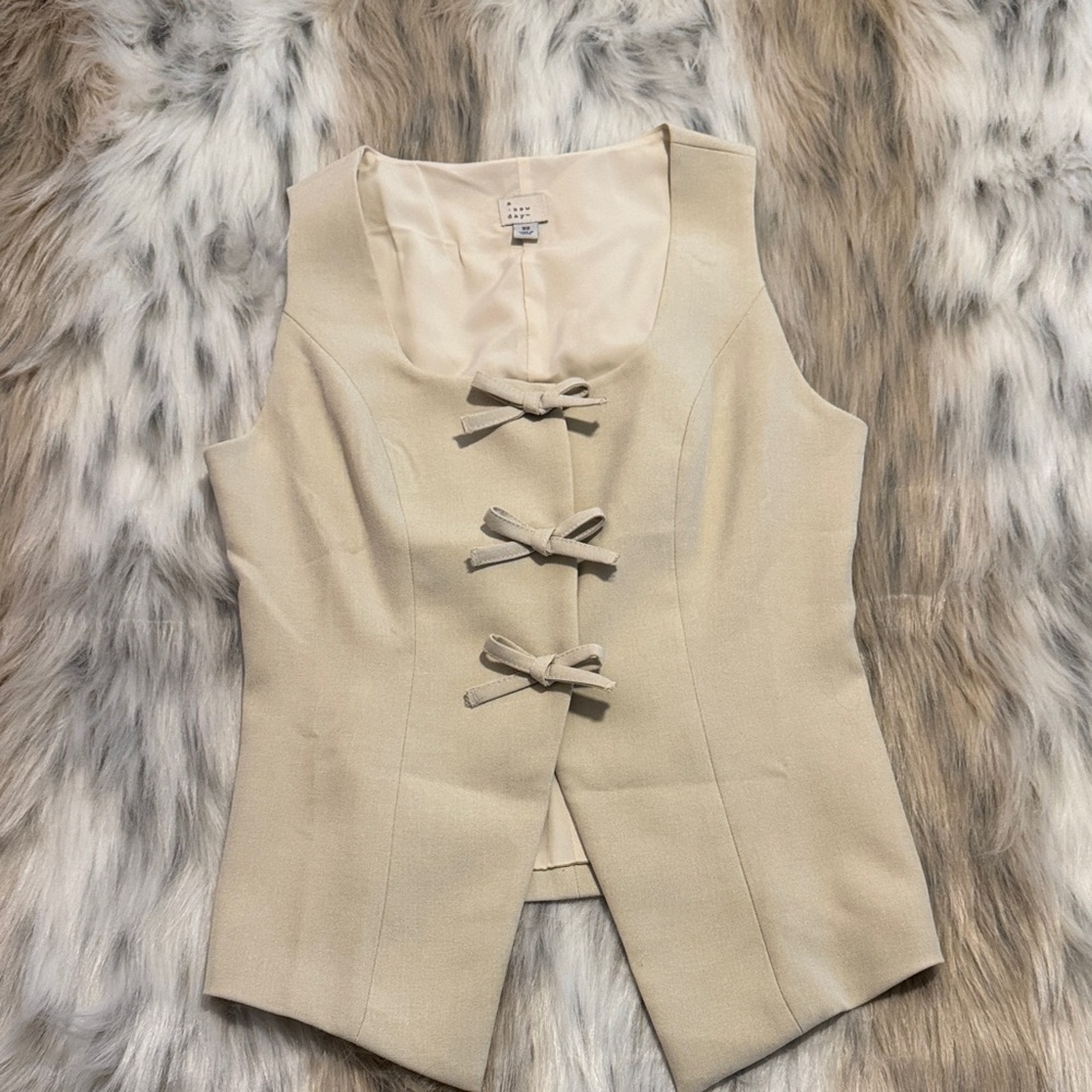 Cream Bow-Front Vest